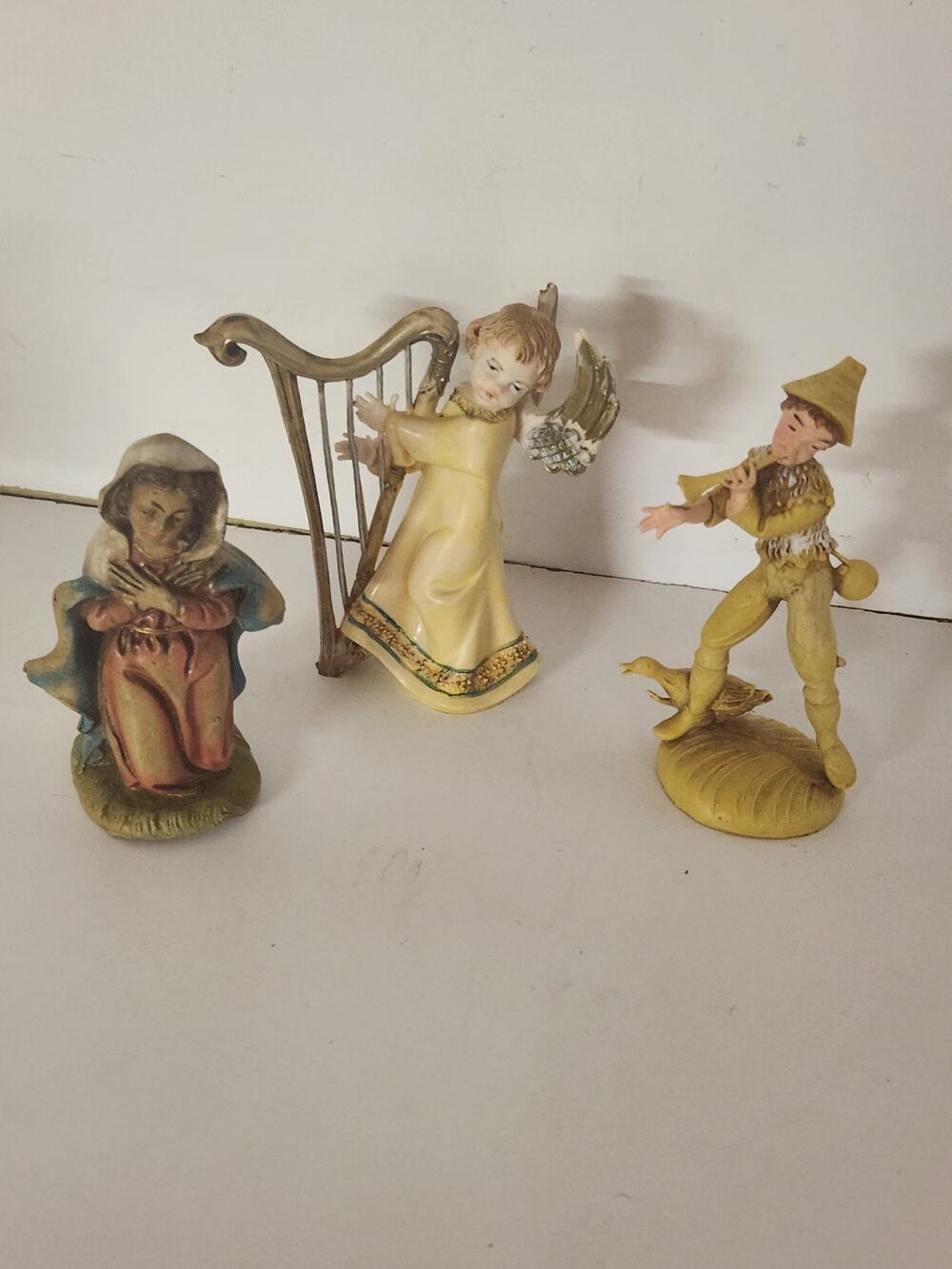 3 Vtg Made in Italy figurines Angel Playing Harp Boy playing horn and Mary